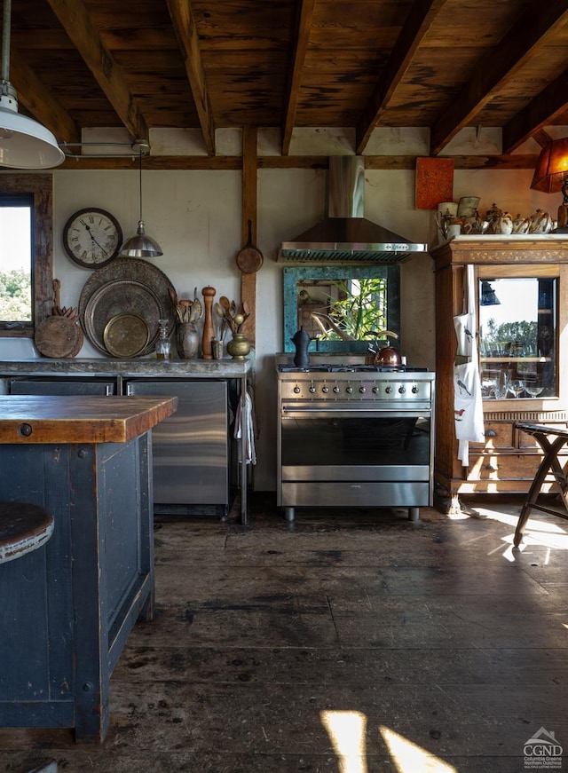 kitchen featuring beam ceiling, high end range, blue cabinets, and wood ceiling