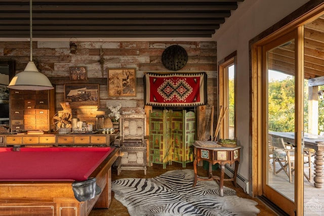 game room with beam ceiling, a baseboard heating unit, and pool table