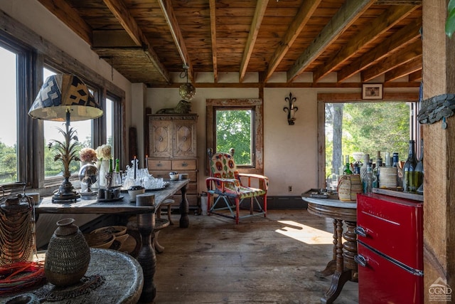 interior space featuring beam ceiling and wood ceiling