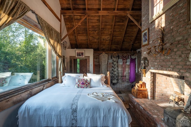 unfurnished bedroom with beam ceiling, wood ceiling, high vaulted ceiling, and multiple windows