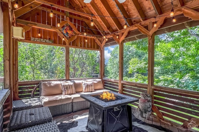 unfurnished sunroom featuring lofted ceiling