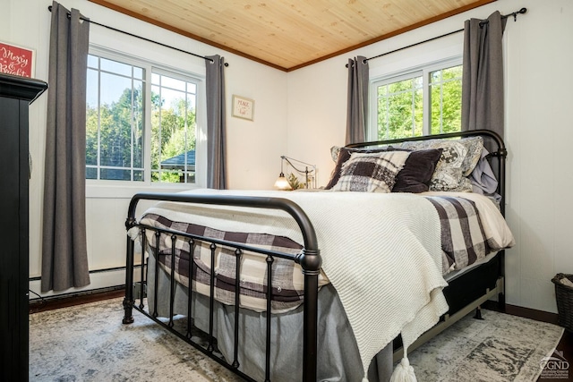 bedroom with multiple windows, ornamental molding, wooden ceiling, and light hardwood / wood-style floors