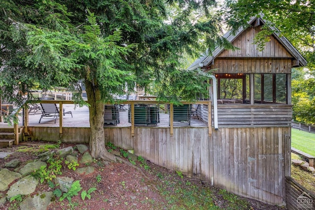 view of yard with a wooden deck