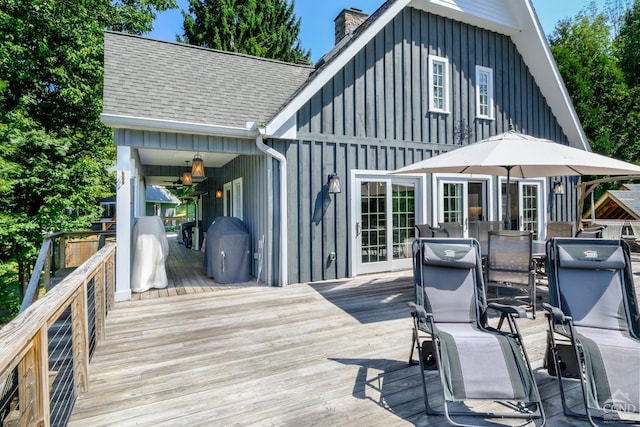 wooden deck with grilling area