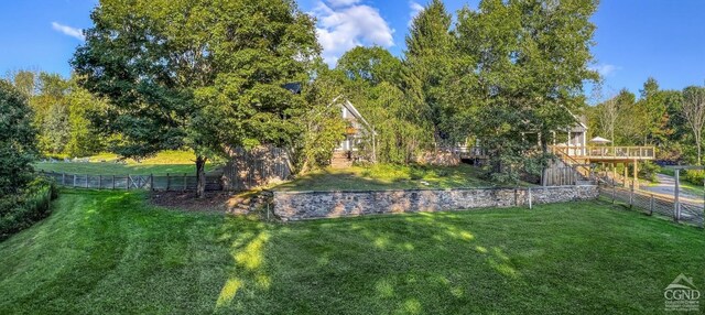 view of yard featuring a deck