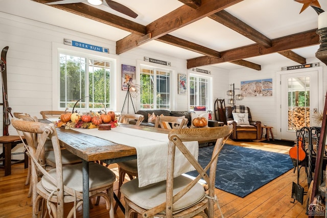 sunroom with beam ceiling