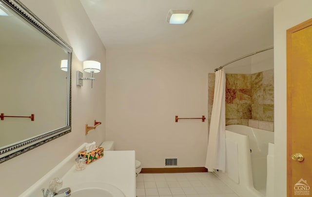 full bathroom with tile patterned flooring, sink, shower / bath combo with shower curtain, and toilet