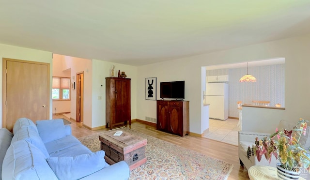 living room featuring light wood-type flooring