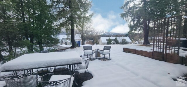 view of snow covered patio