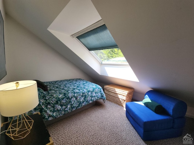 bedroom with carpet floors and vaulted ceiling