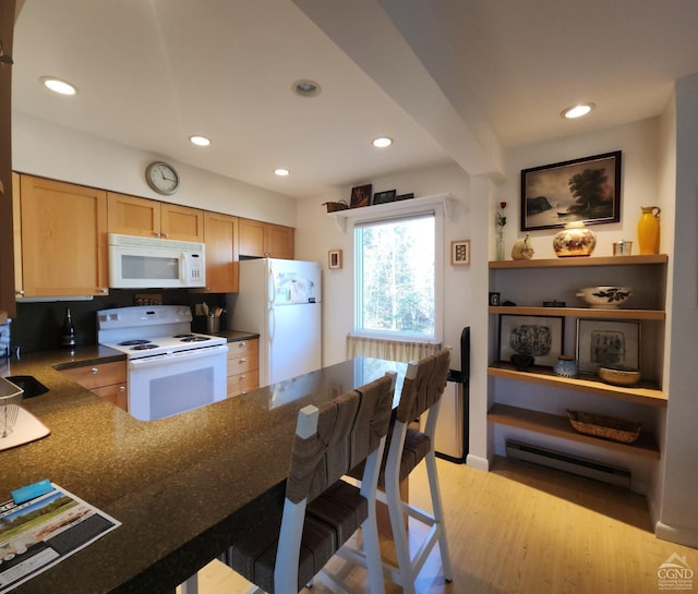 kitchen with white appliances, sink, light hardwood / wood-style flooring, baseboard heating, and kitchen peninsula