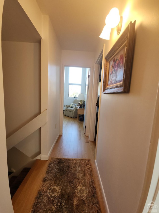 corridor featuring light hardwood / wood-style floors