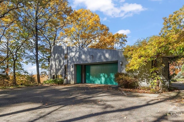 view of outbuilding with a garage