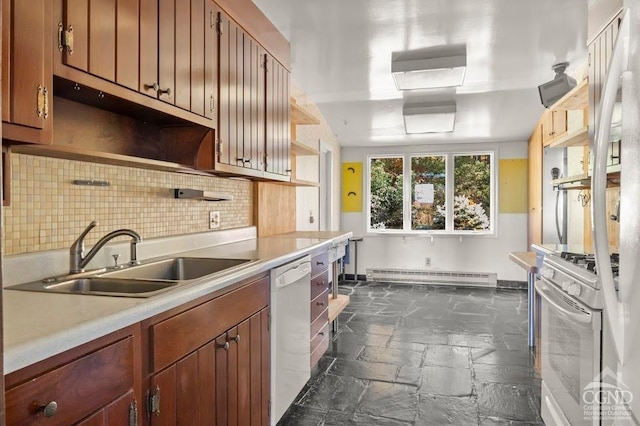 kitchen with white appliances, a baseboard radiator, tasteful backsplash, and sink