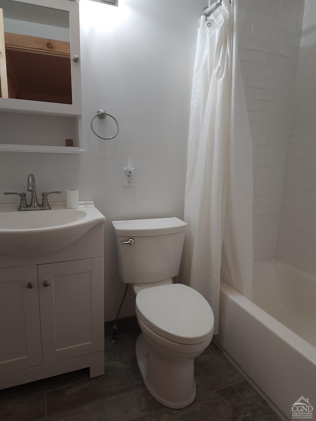 full bathroom with hardwood / wood-style floors, vanity, toilet, and shower / tub combo with curtain