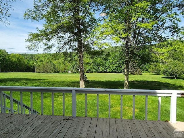 deck featuring a lawn