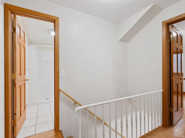 corridor featuring light hardwood / wood-style floors