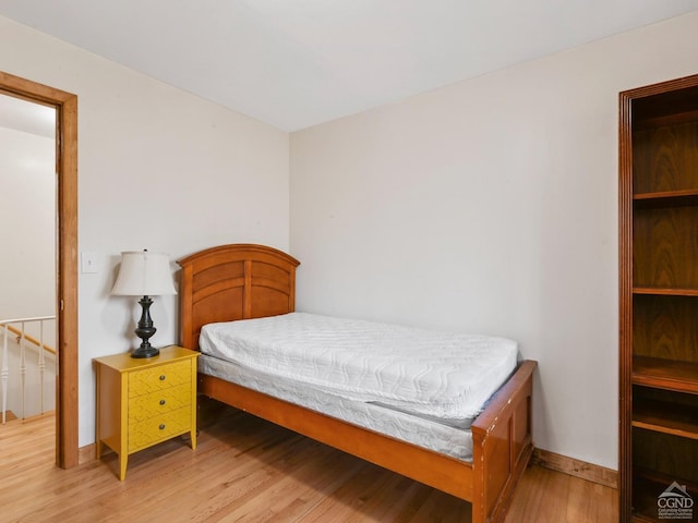 bedroom featuring hardwood / wood-style floors