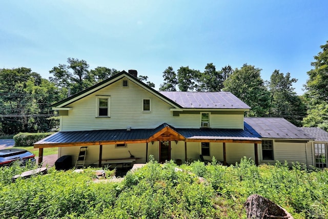 view of front facade with solar panels