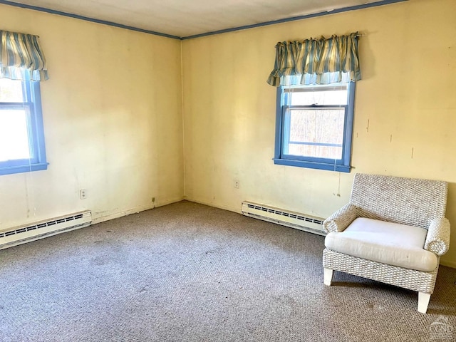 unfurnished room with carpet and baseboard heating