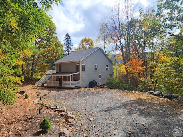 exterior space featuring a sunroom