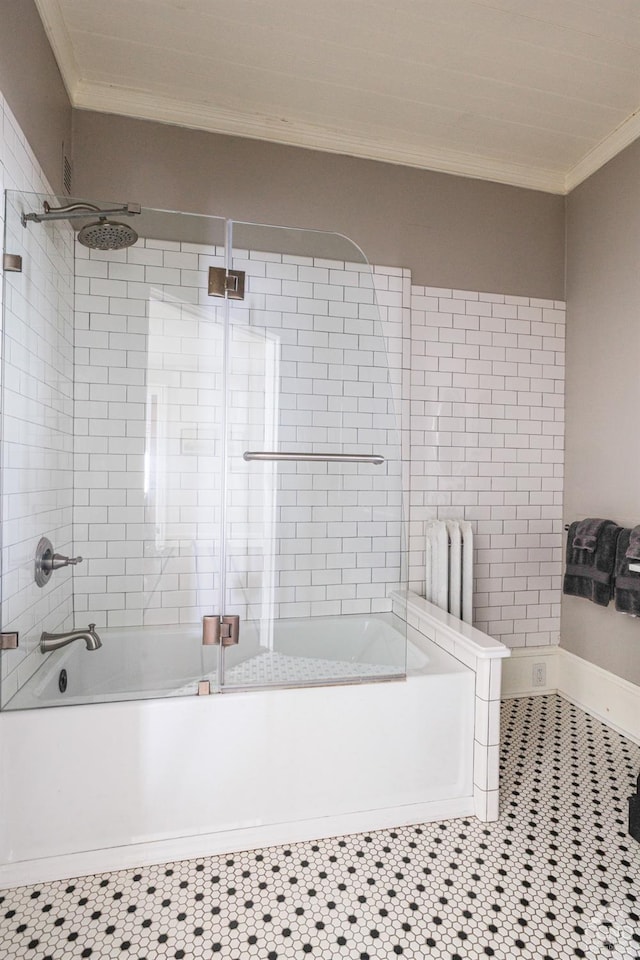 full bath with tile patterned flooring, radiator heating unit, bath / shower combo with glass door, and crown molding