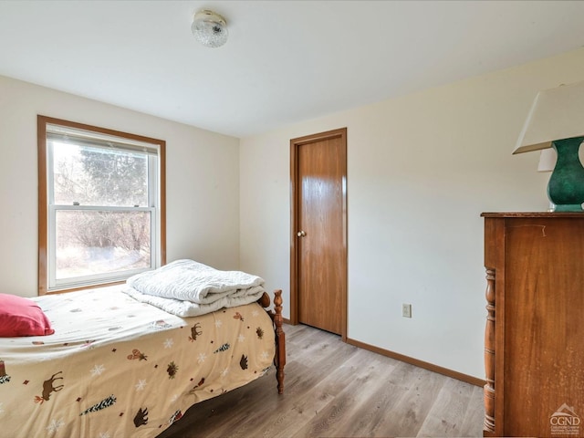 bedroom featuring light hardwood / wood-style floors