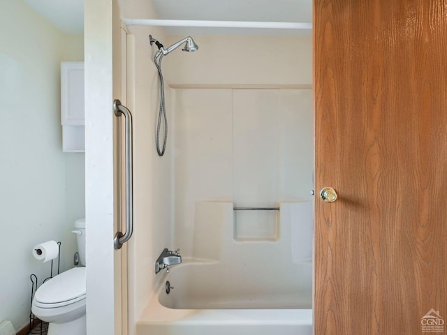 bathroom with toilet and shower / bathtub combination