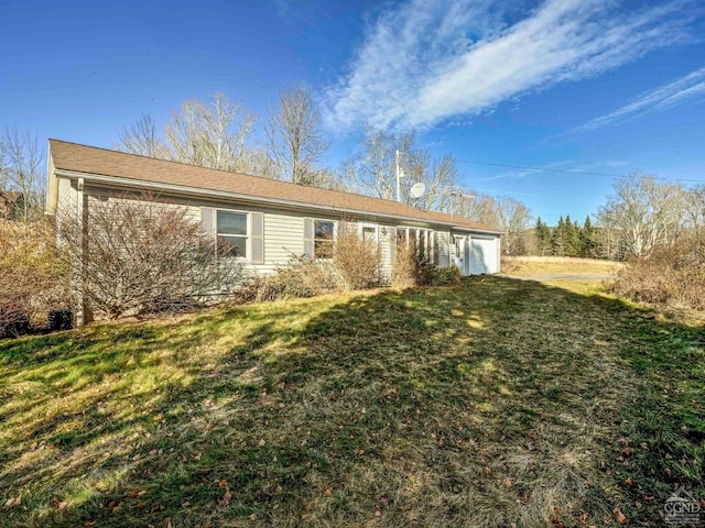 single story home with a front yard