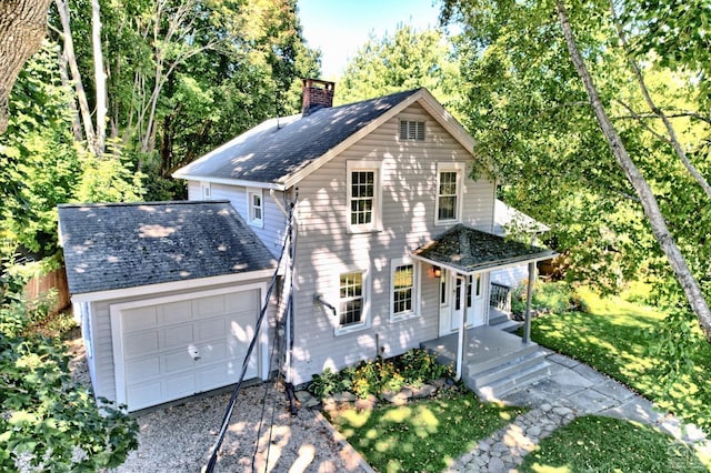 view of front of home with a porch and a front yard