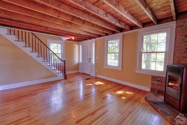 entrance foyer with beamed ceiling, light hardwood / wood-style floors, and wood ceiling