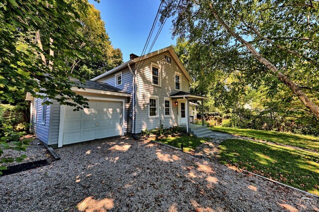 front facade with a front yard