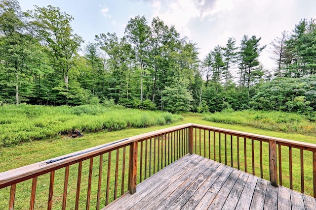 deck featuring a yard