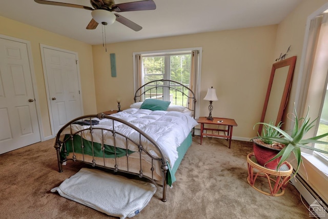 bedroom featuring ceiling fan and light colored carpet