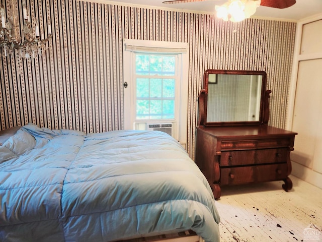 bedroom with ceiling fan and cooling unit