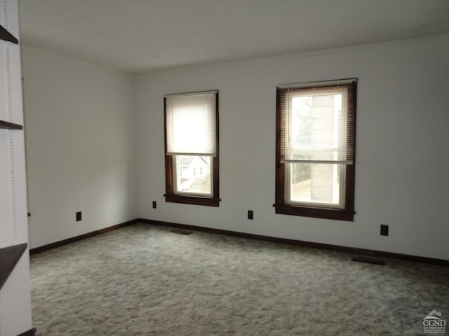 view of carpeted spare room