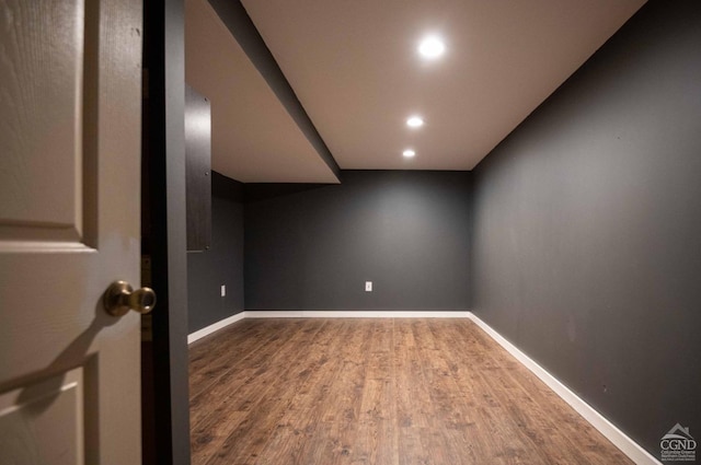 unfurnished room featuring hardwood / wood-style flooring