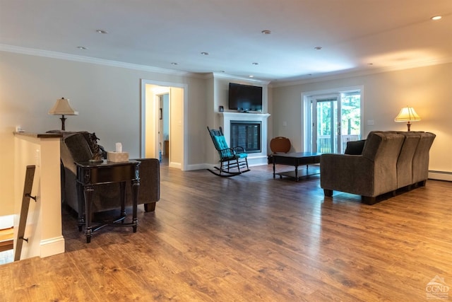 living room featuring ornamental molding and hardwood / wood-style floors