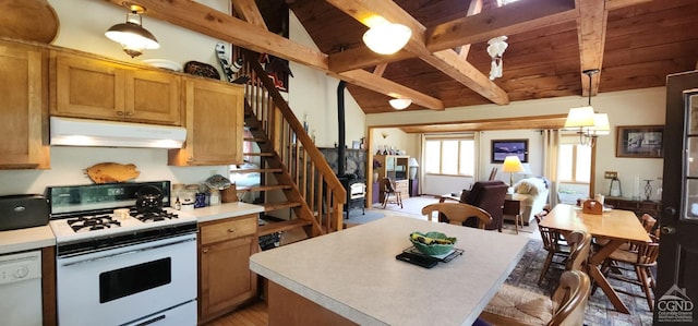 kitchen featuring lofted ceiling with beams, white appliances, light countertops, decorative light fixtures, and under cabinet range hood