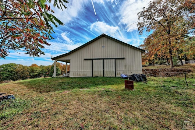 view of outdoor structure featuring a yard