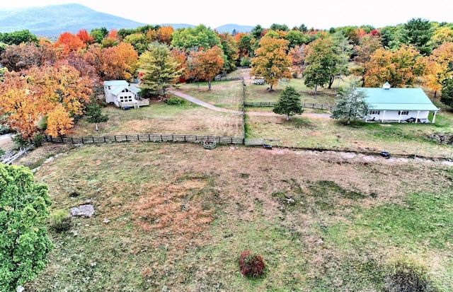 aerial view with a mountain view and a rural view