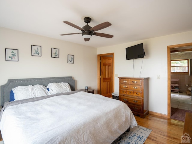 bedroom featuring ceiling fan and light wood-type flooring