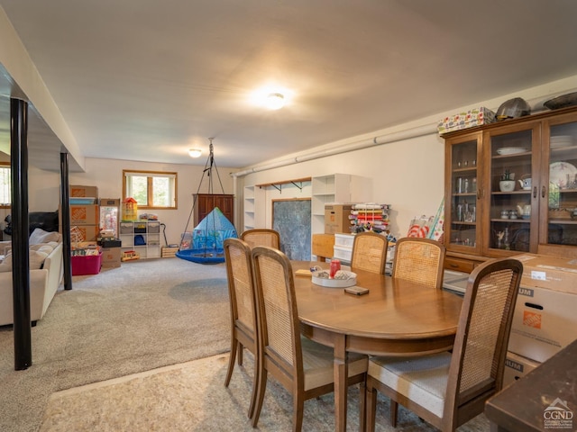 dining area featuring carpet floors