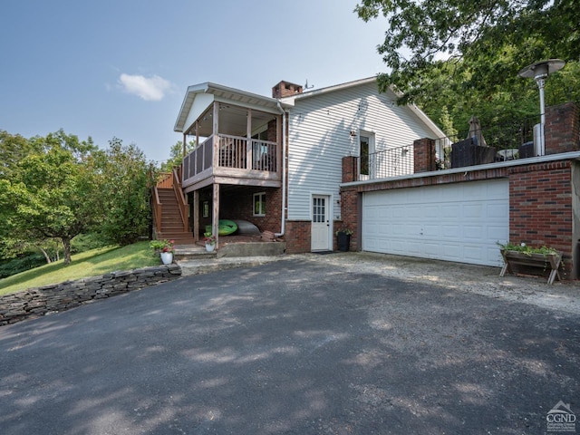 view of front of property with a garage