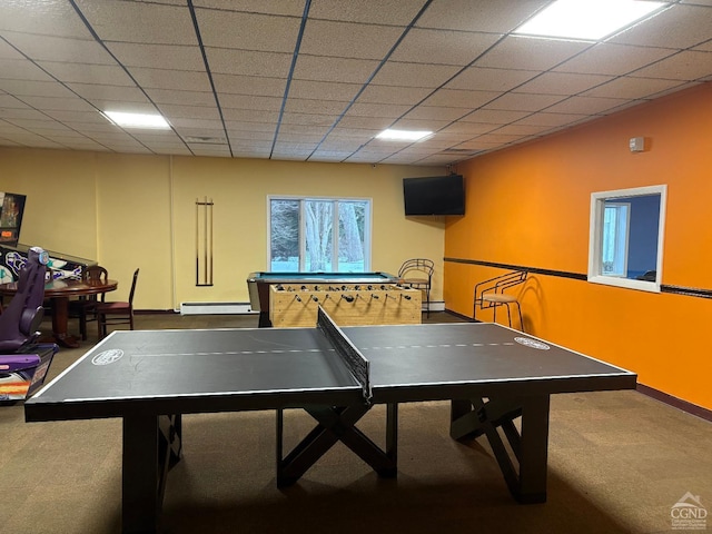 game room with carpet flooring, a paneled ceiling, and baseboard heating