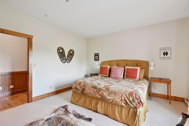 bedroom featuring light colored carpet