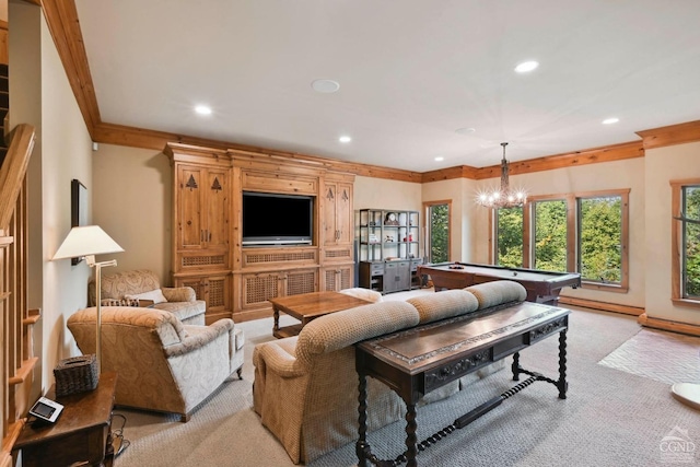 carpeted living room with ornamental molding, a notable chandelier, and billiards