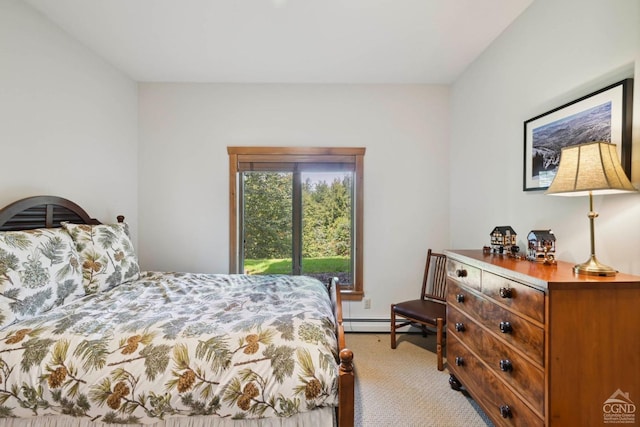 bedroom with light carpet and a baseboard radiator