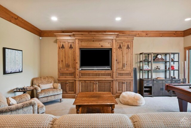 living room with light colored carpet, ornamental molding, and billiards