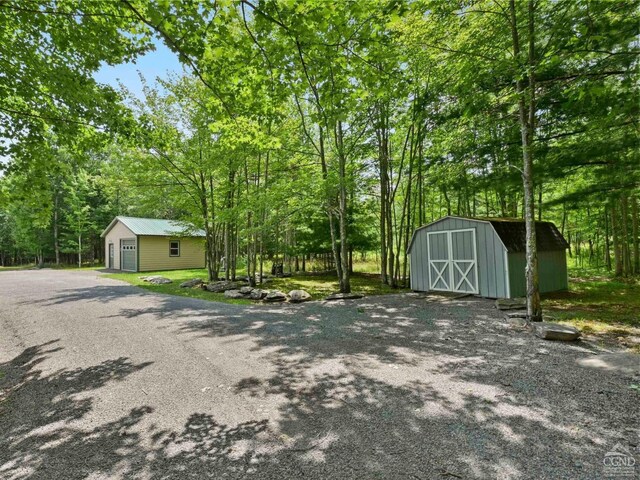 rear view of house featuring a yard and a deck